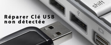 Clé USB non détectée : Une photo montrant un ordinateur portable avec une clé USB débranchée.